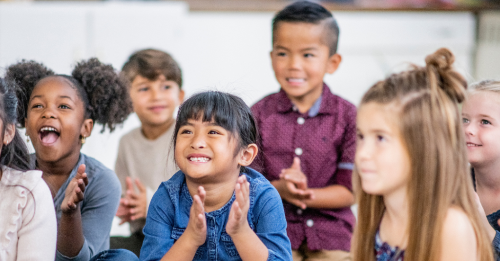 group of children singing Bible songs for kids with actions