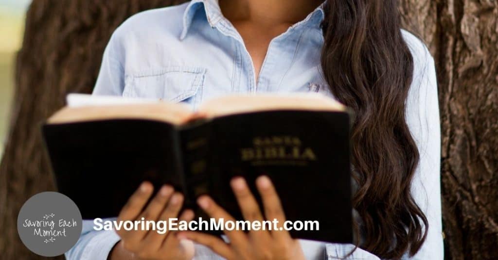 Woman reading Bible verses about not worrying