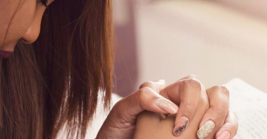 Mother engaging in spiritual warfare prayers for her children